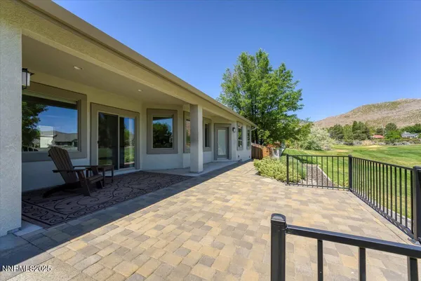 an aerial view of a house with big yard
