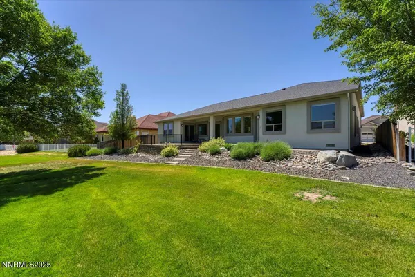 an aerial view of residential houses and outdoor space