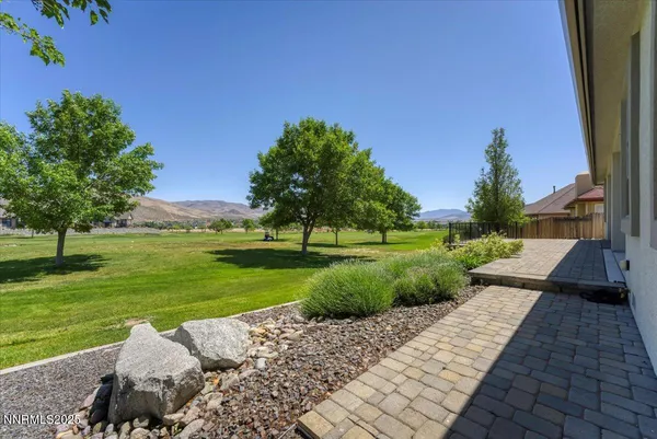 an aerial view of residential houses and outdoor space