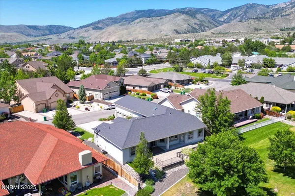 a view of a city with mountains in the background