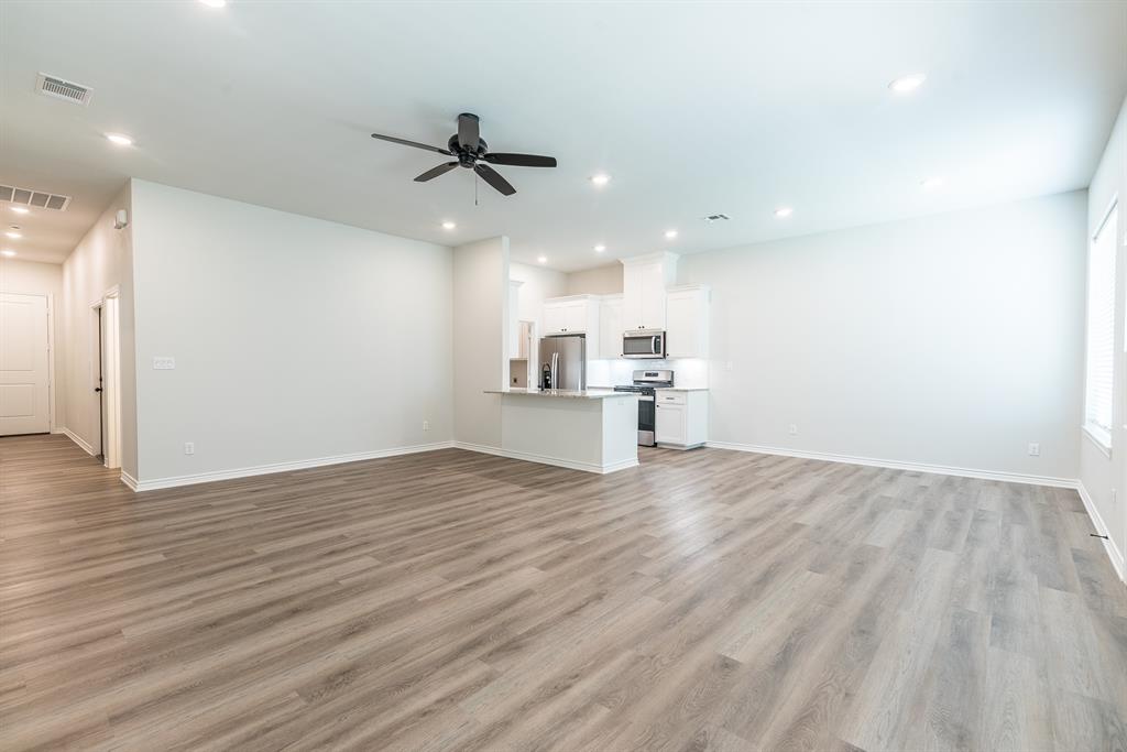 14151 County Road 192 Tyler, TX 75703 - Photo 15 of 28 a view of a kitchen with a sink and wooden floor