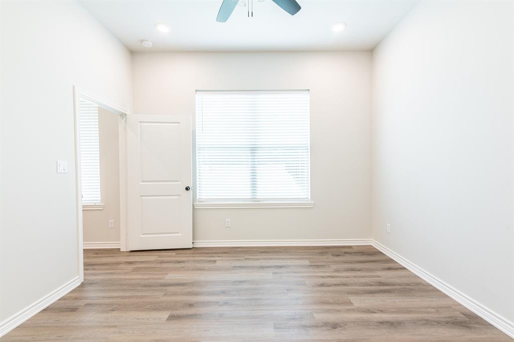 14151 County Road 192 Tyler, TX 75703 - Photo 19 of 28 a view of a room with wooden floor and windows