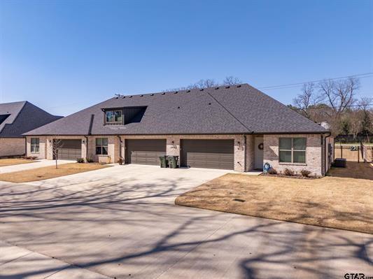 14151 County Road 192 Tyler, TX 75703 - Photo 5 of 28 a front view of a house with a yard