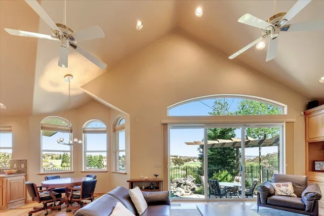 a living room with a fireplace furniture and a fireplace