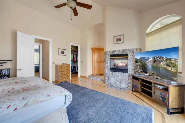 an aerial view of a house with a swimming pool
