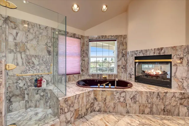 a view of a city with mountains in the background