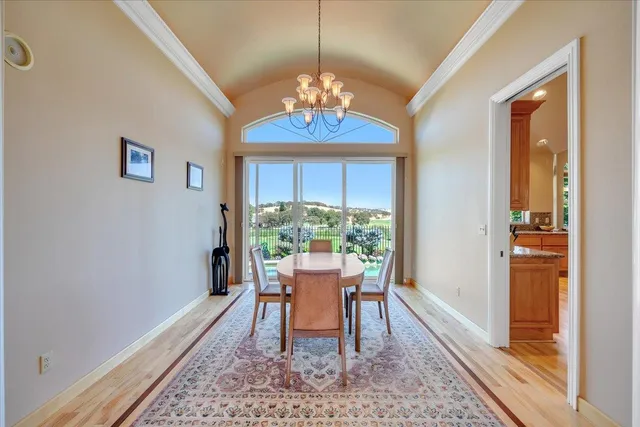 a kitchen with stainless steel appliances granite countertop a stove and refrigerator