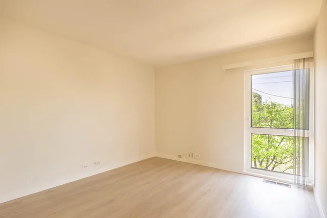 an empty room with a window