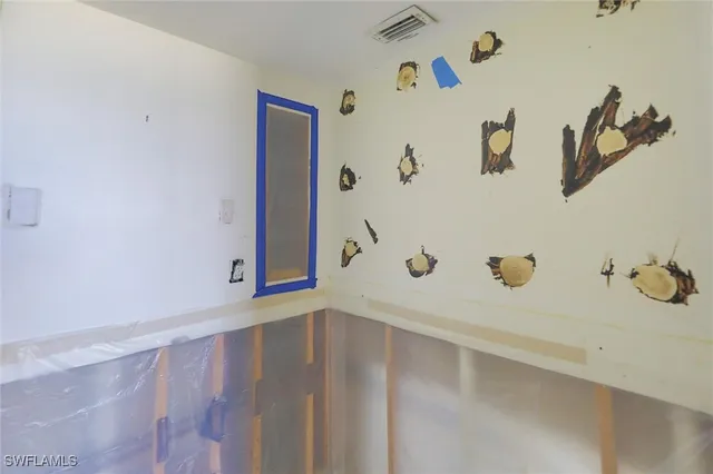 a bathroom with a tub and a shower