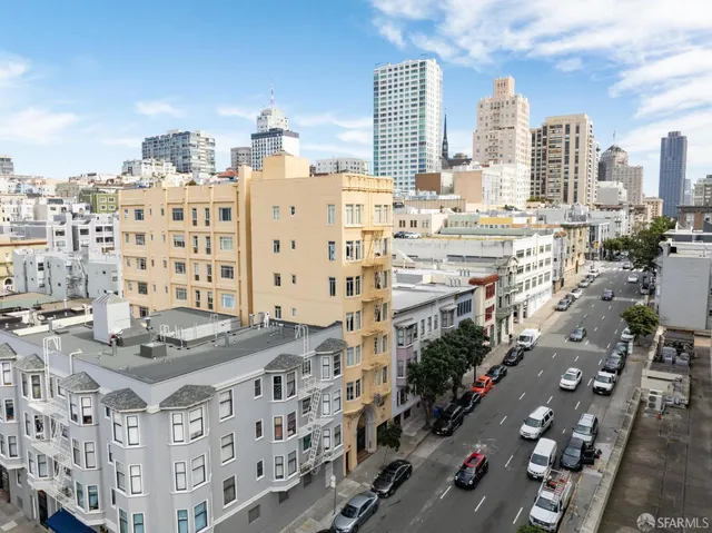 a view of city with tall buildings