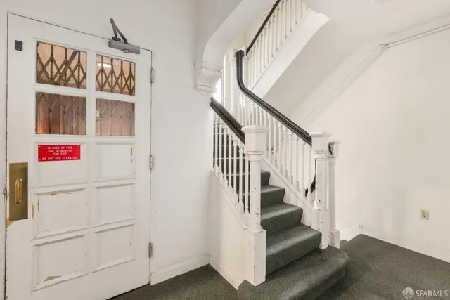 a view of an entryway with staircase