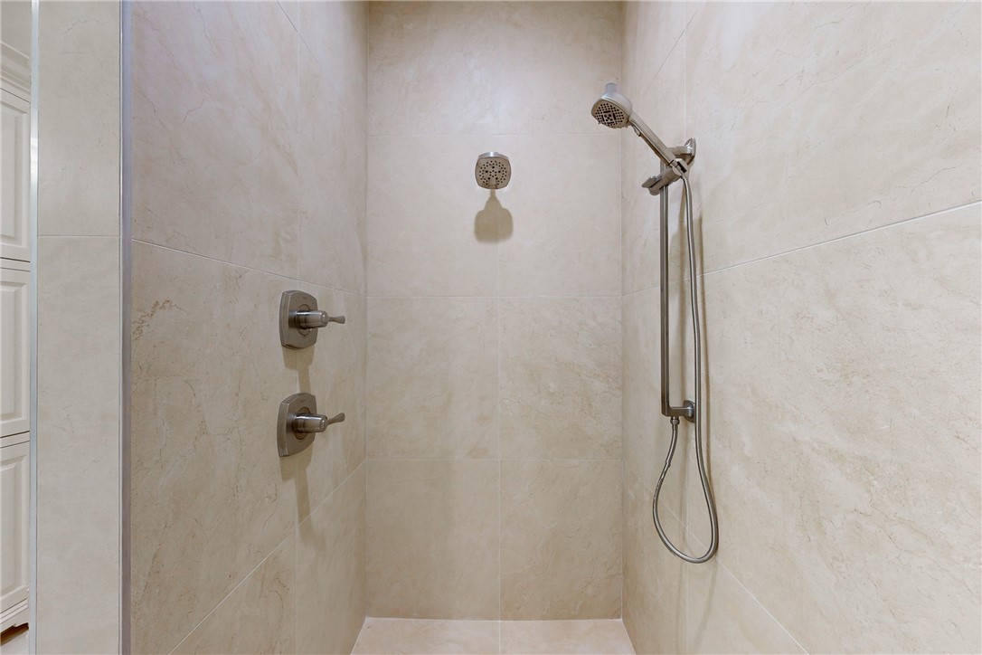 3317 Legacy Court Bryan, TX 77802 - Photo 13 of 28 a bathroom with a shower