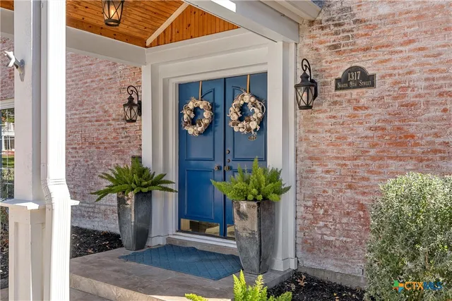 a view of a entryway door of the house