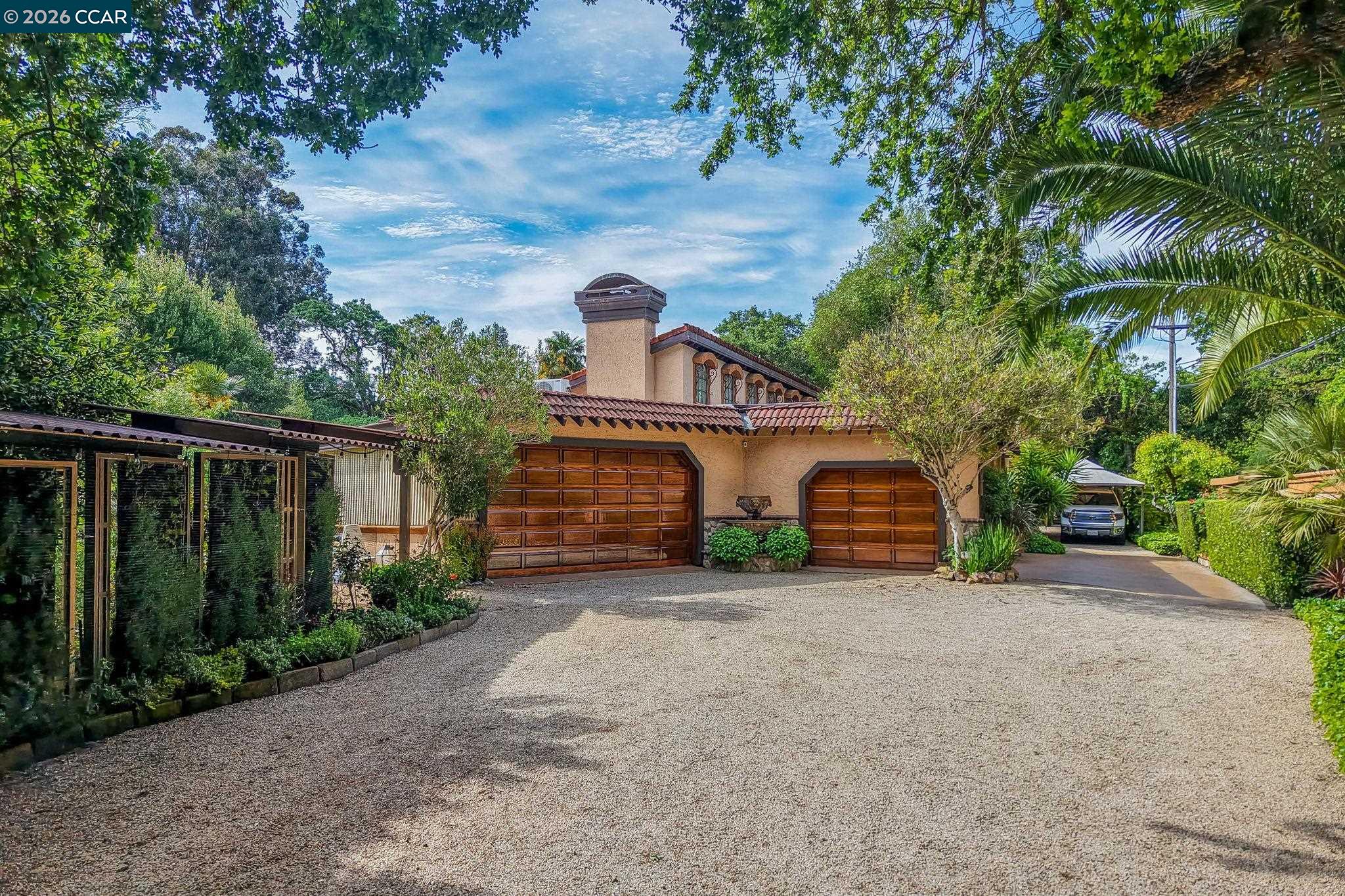 490 St Marys Road Lafayette, CA 94549 - Photo 51 of 61 a view of a house with a yard and garage