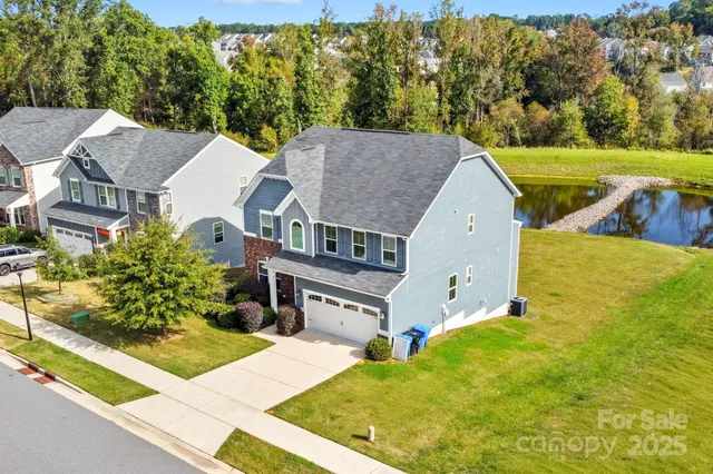 an aerial view of a house with garden