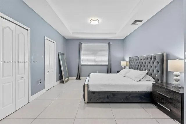 $825,000 | 7521 Northwest 113th Path, Doral, FL 33178