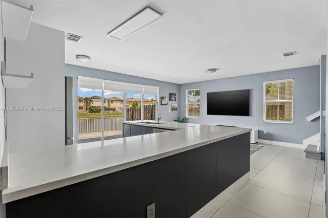 $825,000 | 7521 Northwest 113th Path, Doral, FL 33178