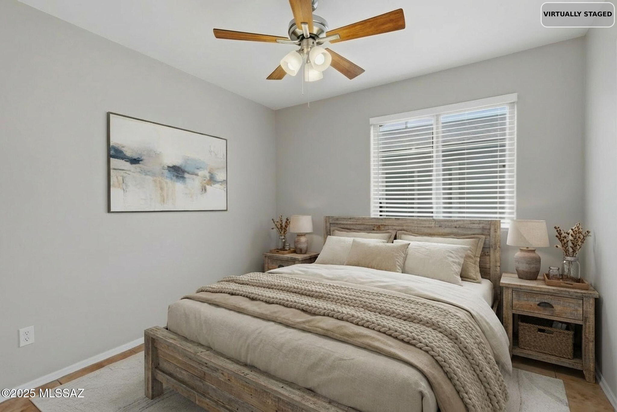 8244 South Lost Mountain Road Tucson, AZ 85747 - Photo 28 of 41 a bedroom with a bed and a window