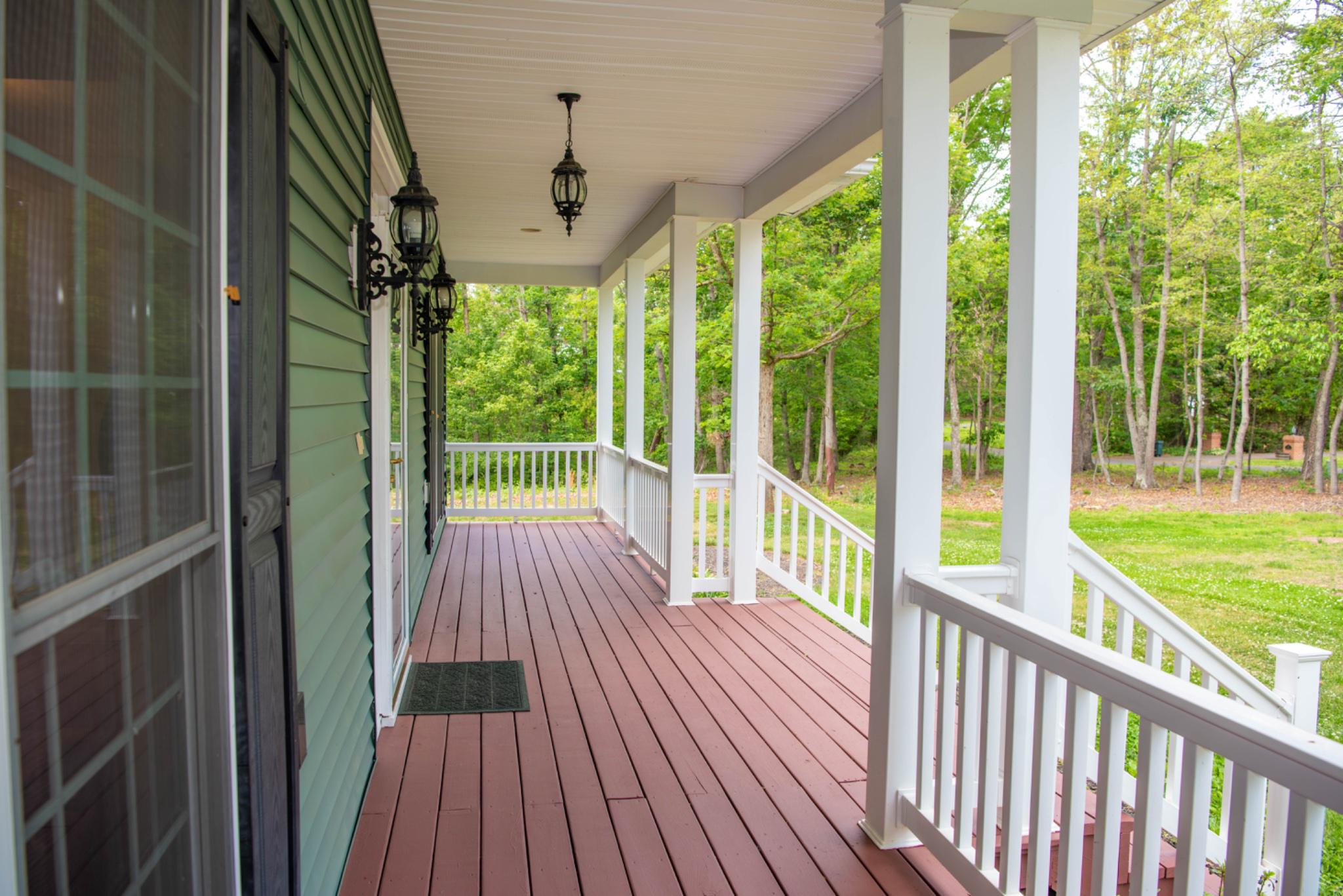 792 Forest Glen Road Moorefield, WV 26836 - Photo 134 of 146 Charming front porch with serene views.