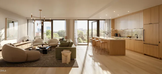 a living room with furniture and large windows