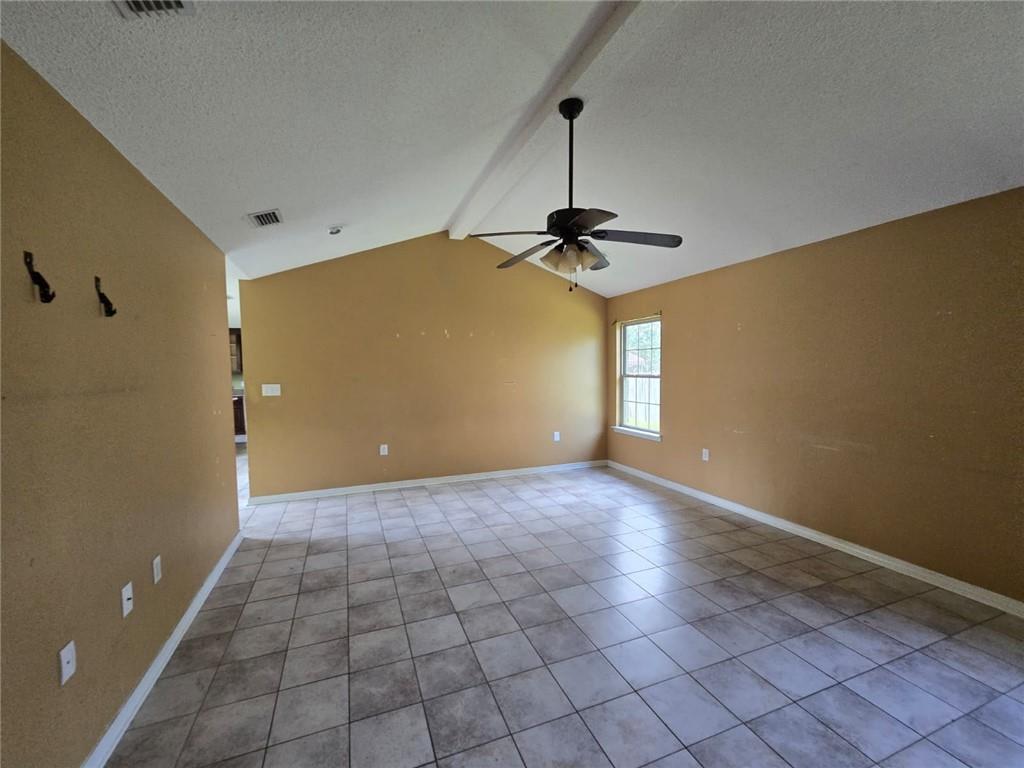 141 McRae Street Atmore, AL 36502 - Photo 17 of 25 a view of empty room with windows