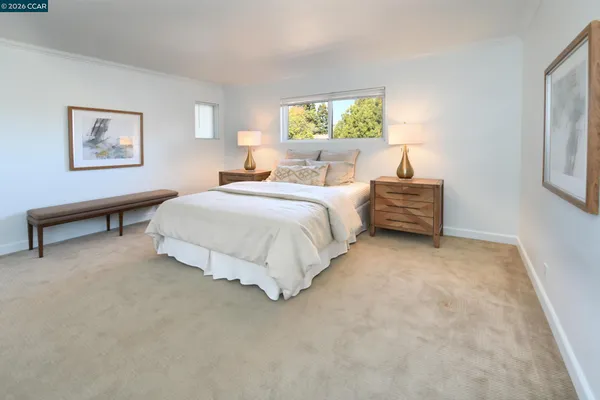 a bed room with a bed and a desk