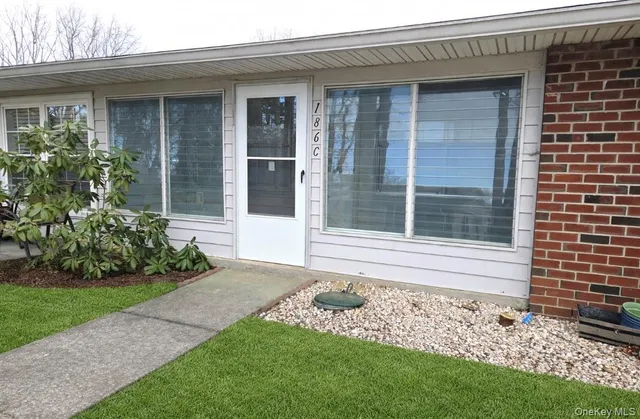 a view of a house with a garden