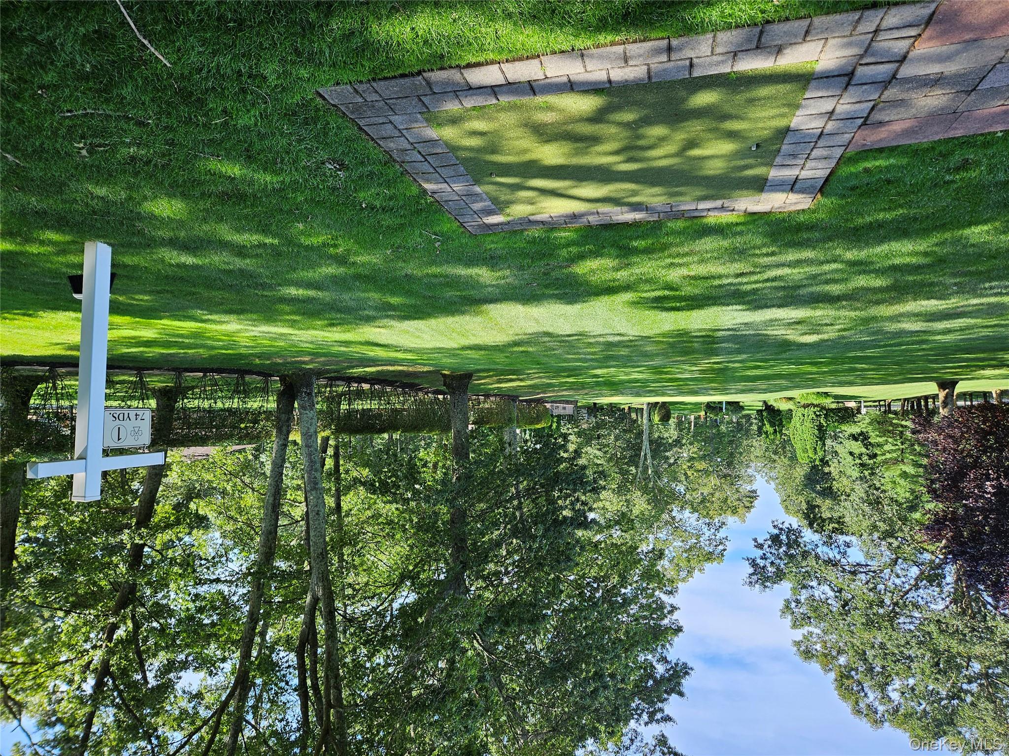 186 C Ventry Court Ridge, NY 11961 - Photo 21 of 25 Leisure Village Offers A Beautiful Meticulously Manicured Private Nine Hole Golf Course. This Is The View From The First Tee.