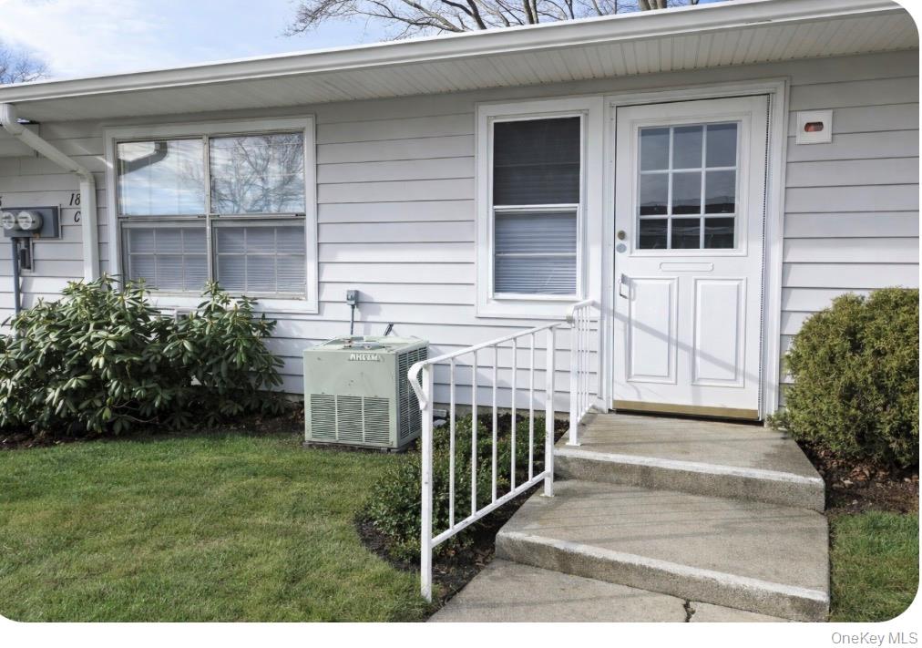 186 C Ventry Court Ridge, NY 11961 - Photo 4 of 25 Back Entrance To The Condo With Direct Access To Parking.