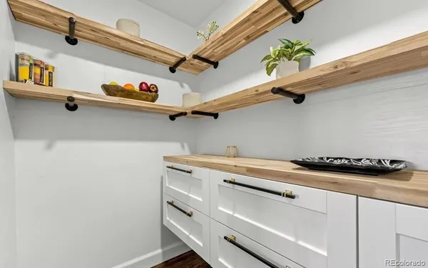 a view of storage and utility room with washer and dryer