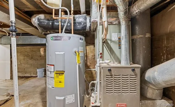 a front view of a house with outdoor seating