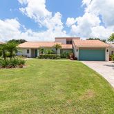 a front view of house with yard
