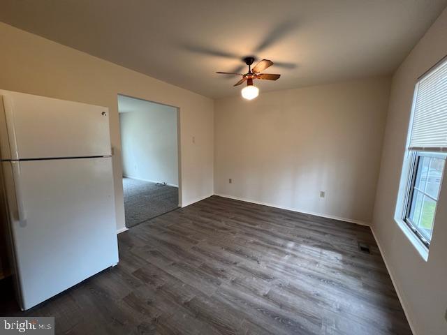 3801 8th Street North Beach, MD 20714 - Photo 4 of 13 a view of empty room with wooden floor and fan