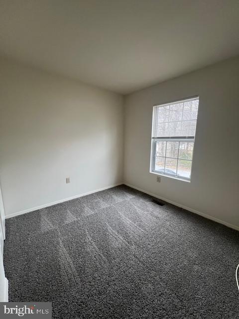 3801 8th Street North Beach, MD 20714 - Photo 7 of 13 an empty room with windows