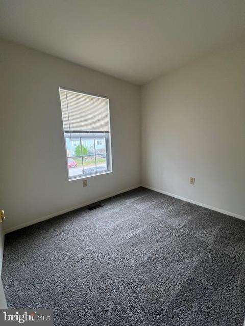 3801 8th Street North Beach, MD 20714 - Photo 8 of 13 an empty room with windows