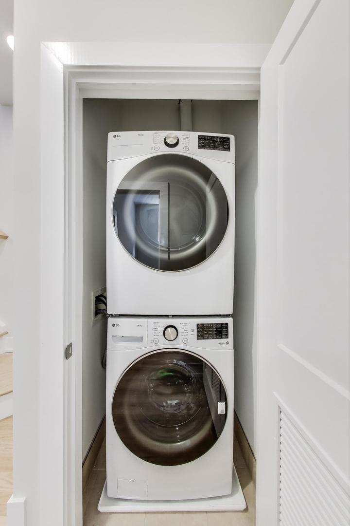 3339 North Ridgeway Avenue, Unit 1S Chicago, IL 60618 - Photo 17 of 20 a utility room with dryer and washer