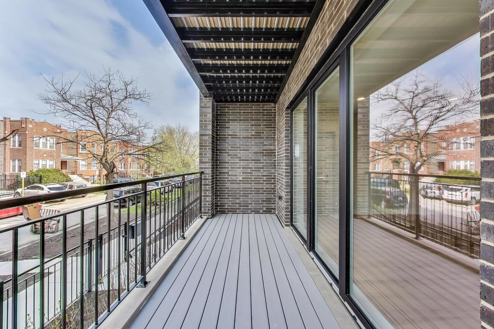 3339 North Ridgeway Avenue, Unit 1S Chicago, IL 60618 - Photo 19 of 20 a view of balcony with wooden floor