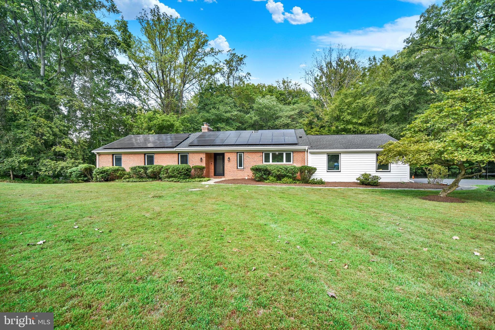 900 Stags Head Road Towson, MD 21286 - Photo 1 of 83 a front view of house with a garden and porch