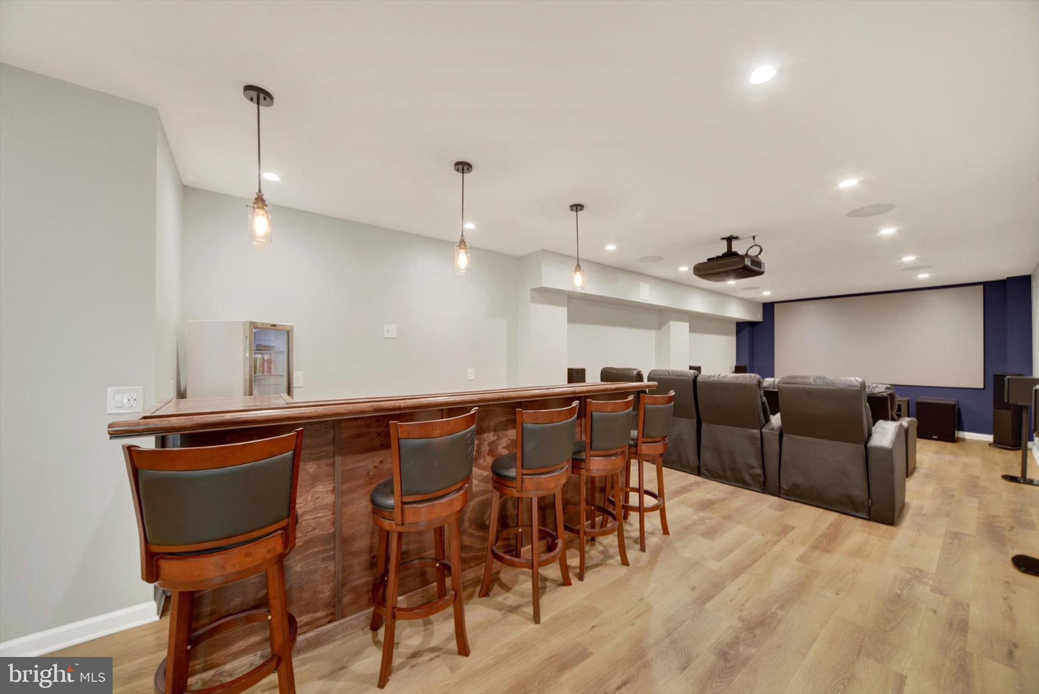 900 Stags Head Road Towson, MD 21286 - Photo 45 of 83 a view of a dining area with furniture and wooden floor