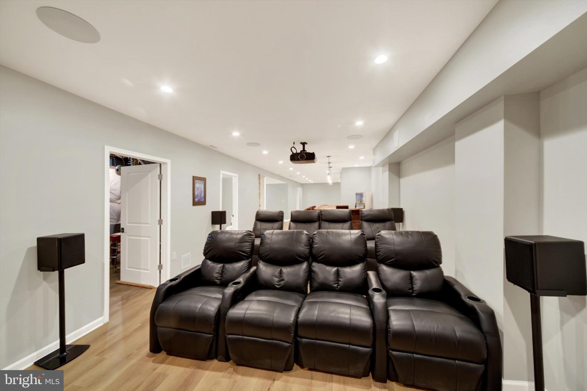 900 Stags Head Road Towson, MD 21286 - Photo 51 of 83 a media room with lots of chairs and a projector