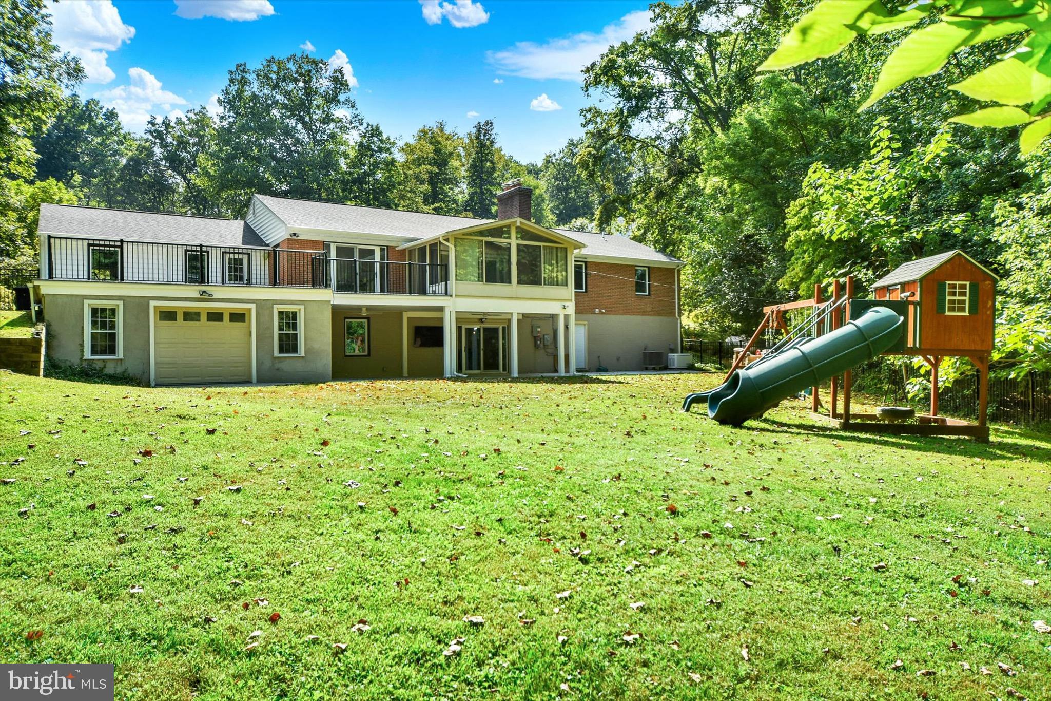 900 Stags Head Road Towson, MD 21286 - Photo 60 of 83 a front view of a house with a yard
