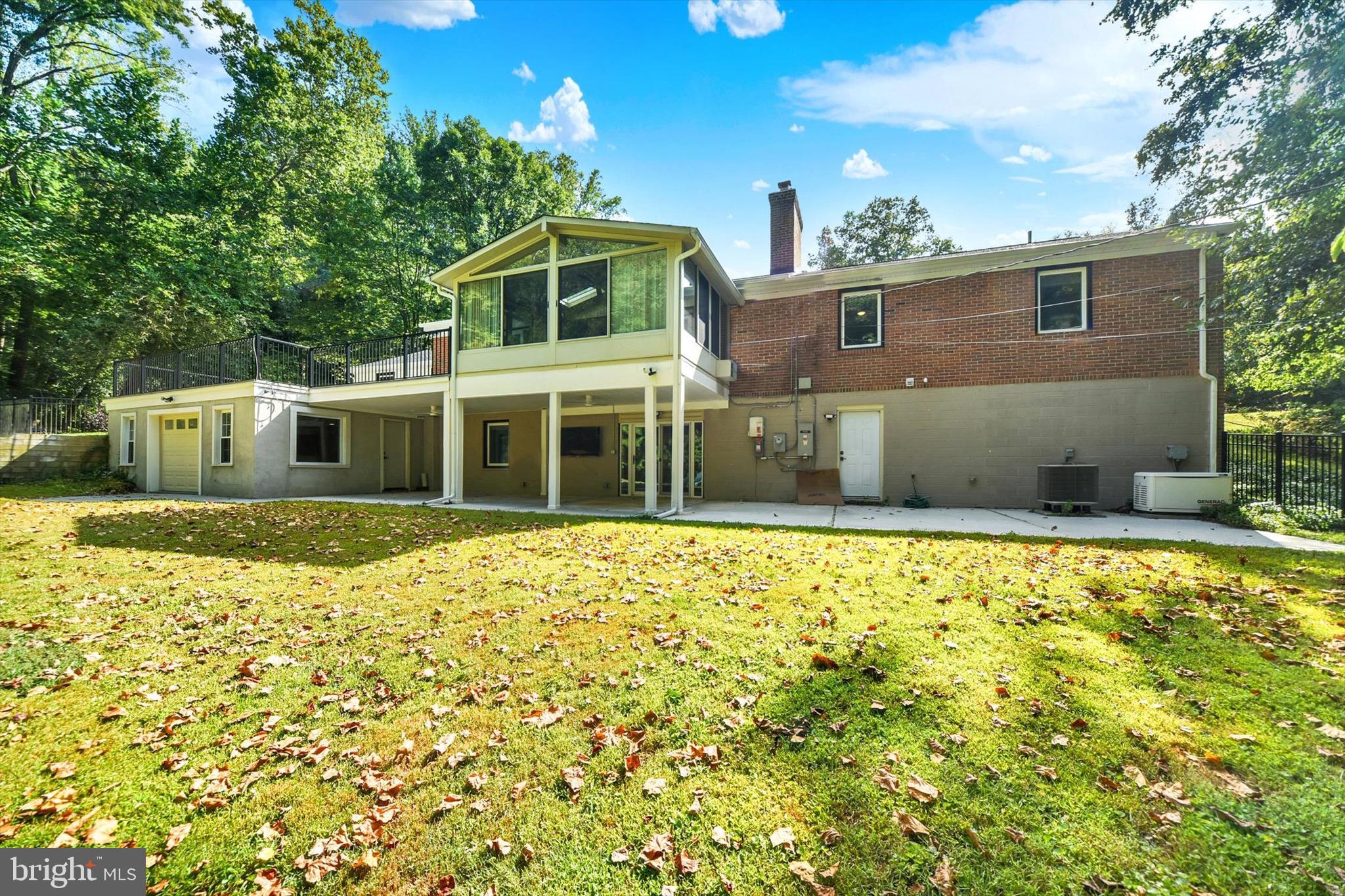 900 Stags Head Road Towson, MD 21286 - Photo 61 of 83 a front view of a house with a yard