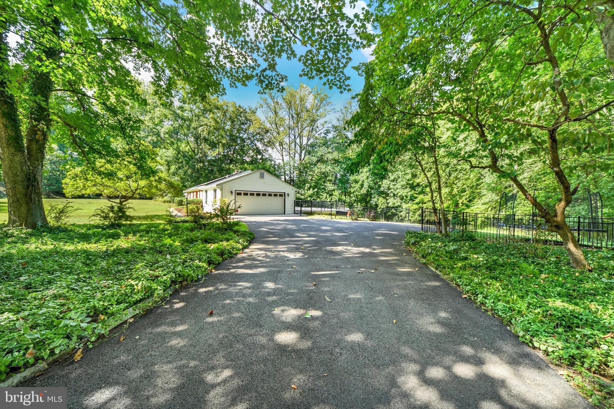 900 Stags Head Road Towson, MD 21286 - Photo 65 of 83 a front view of a house with a yard