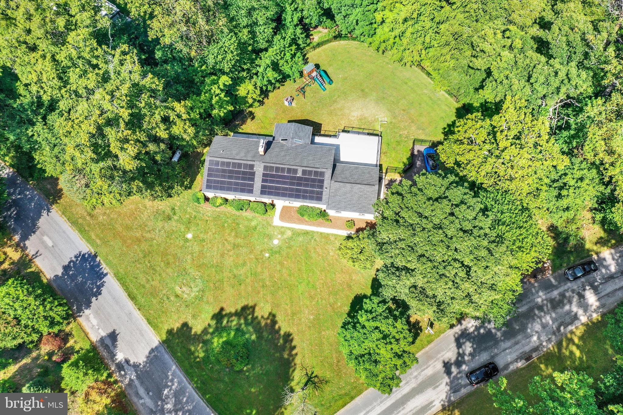 900 Stags Head Road Towson, MD 21286 - Photo 76 of 83 an aerial view of a house with a yard swimming pool and outdoor seating
