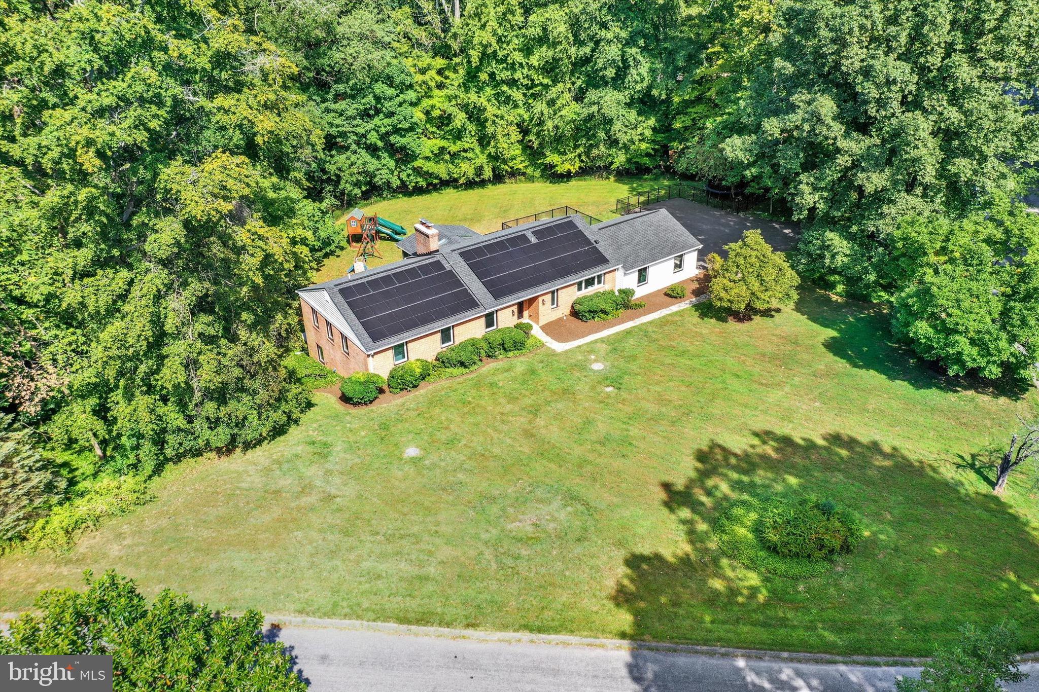 900 Stags Head Road Towson, MD 21286 - Photo 78 of 83 an aerial view of a house with a yard basket ball court and outdoor seating
