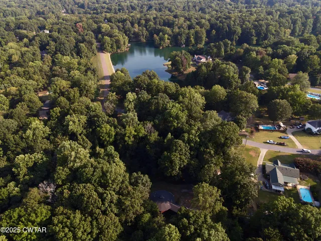 an aerial view of city and lake view