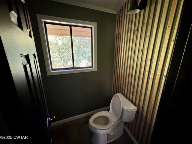 a view of balcony with wooden floor