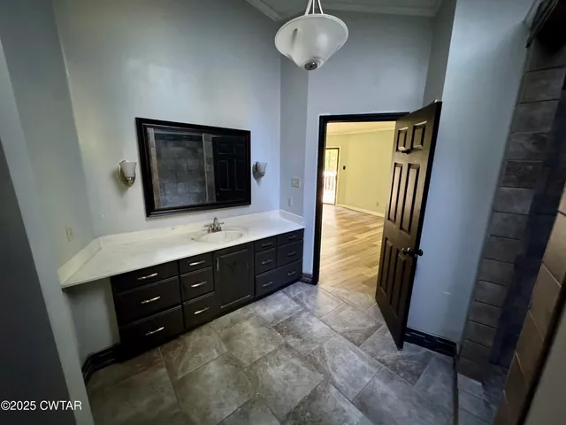 a view of a livingroom with a large window
