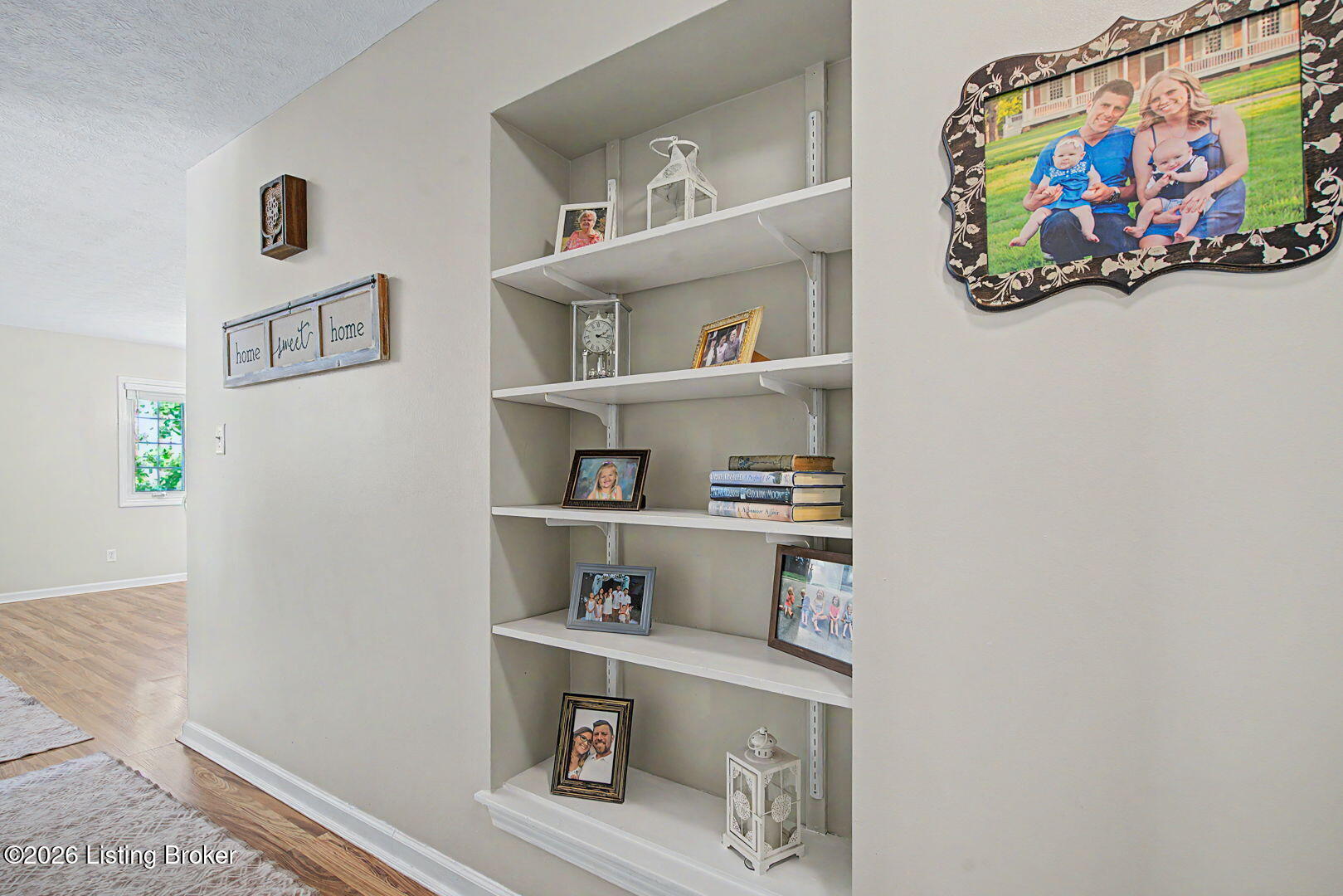 8121 Damascus Road Louisville, KY 40228 - Photo 16 of 49 Hallway nook is perfect for books and anything you'd like to display.