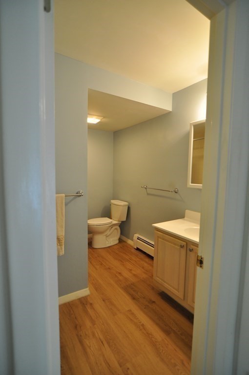 90 Beacon Street, Unit 8 Lawrence, MA 01843 - Photo 11 of 26 a bathroom with a sink and a toilet